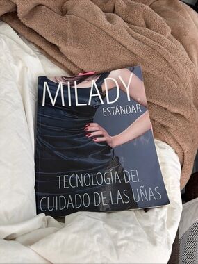 Milady Standard Nail technology Spanish ediction Cosmetology textbook